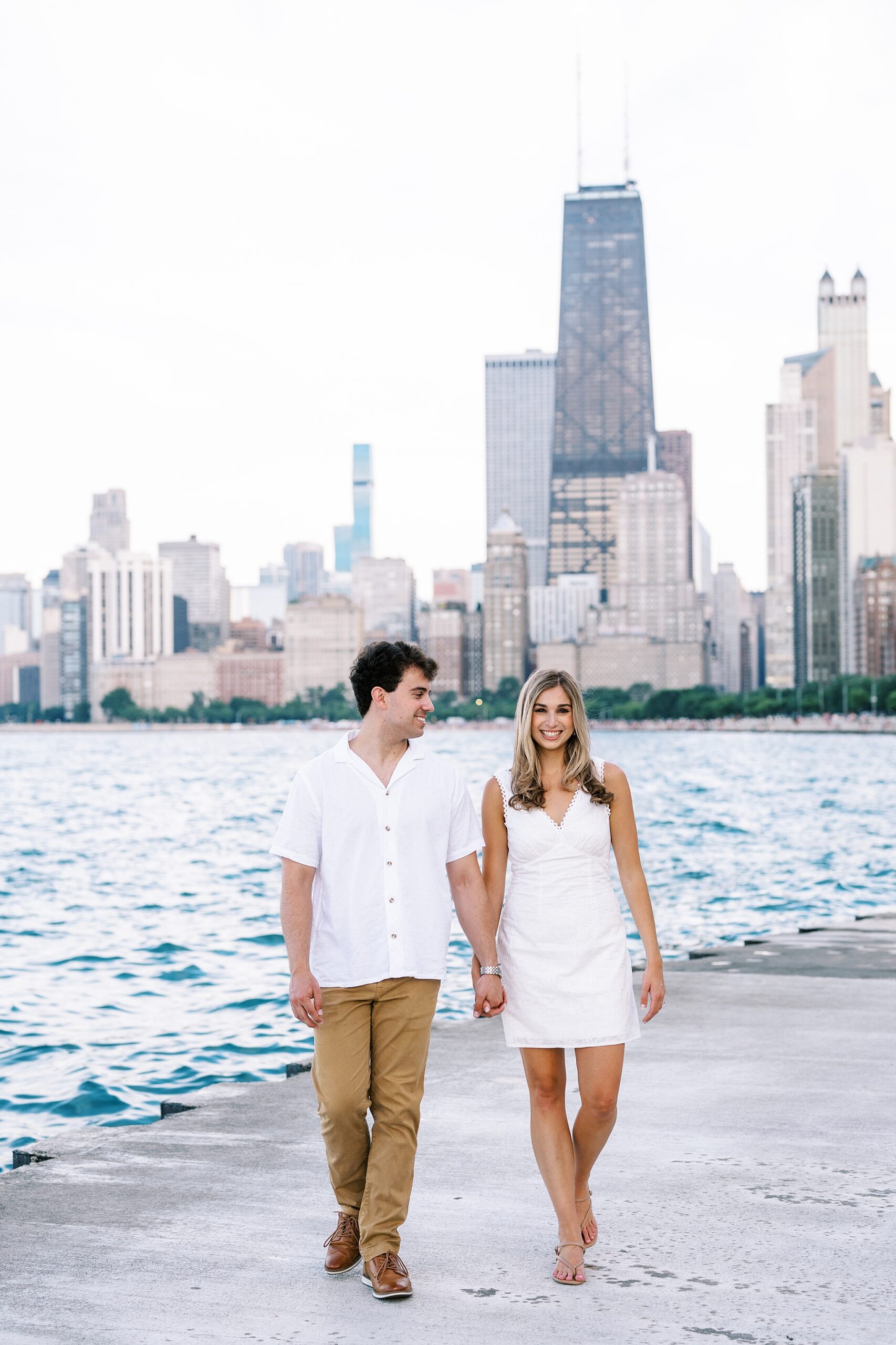 Summer engagement photos at the Wrigley Building & North Avenue Beach with Chicago wedding photographer Kim Ritchie Photography.