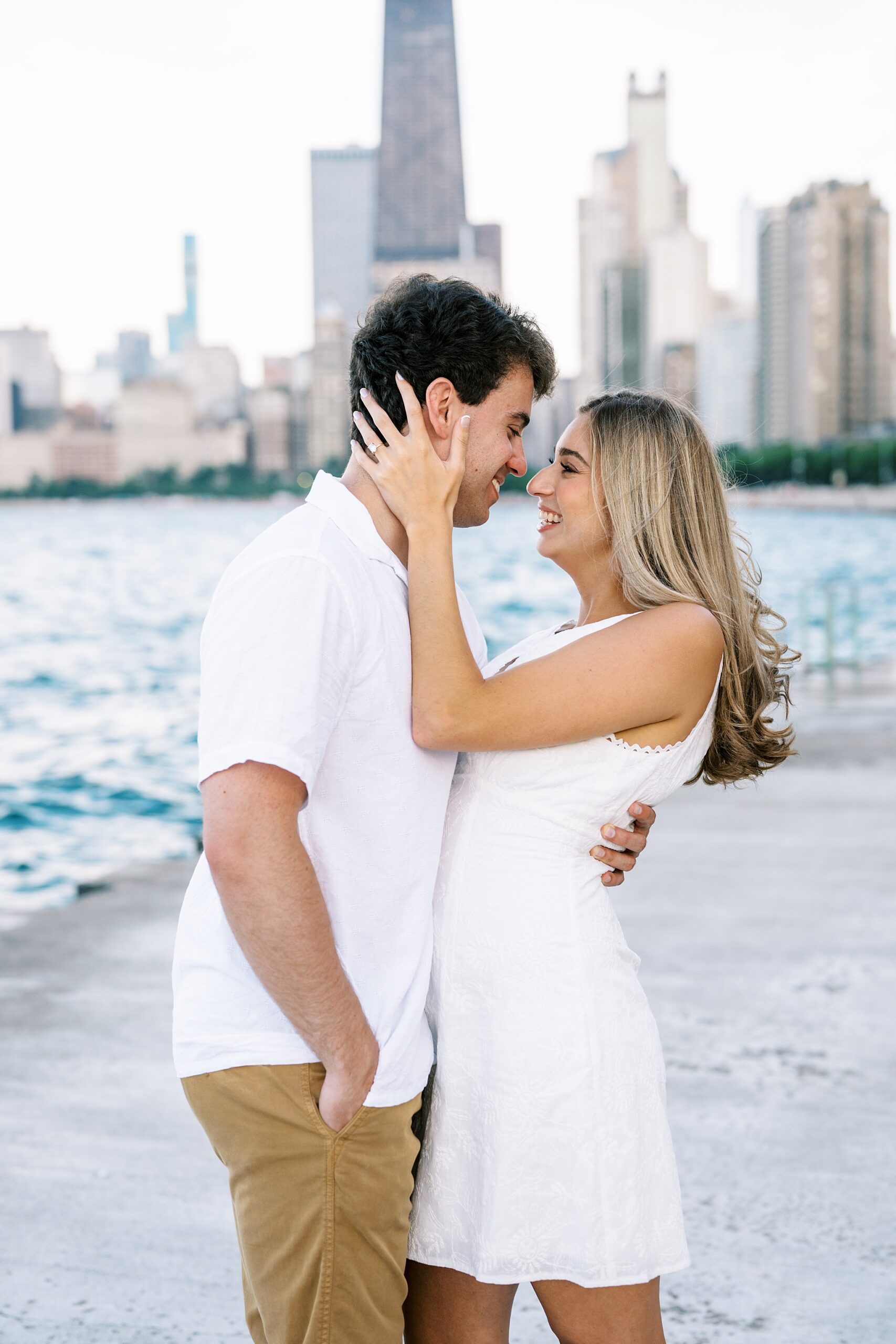 Summer engagement photos at the Wrigley Building & North Avenue Beach with Chicago wedding photographer Kim Ritchie Photography.