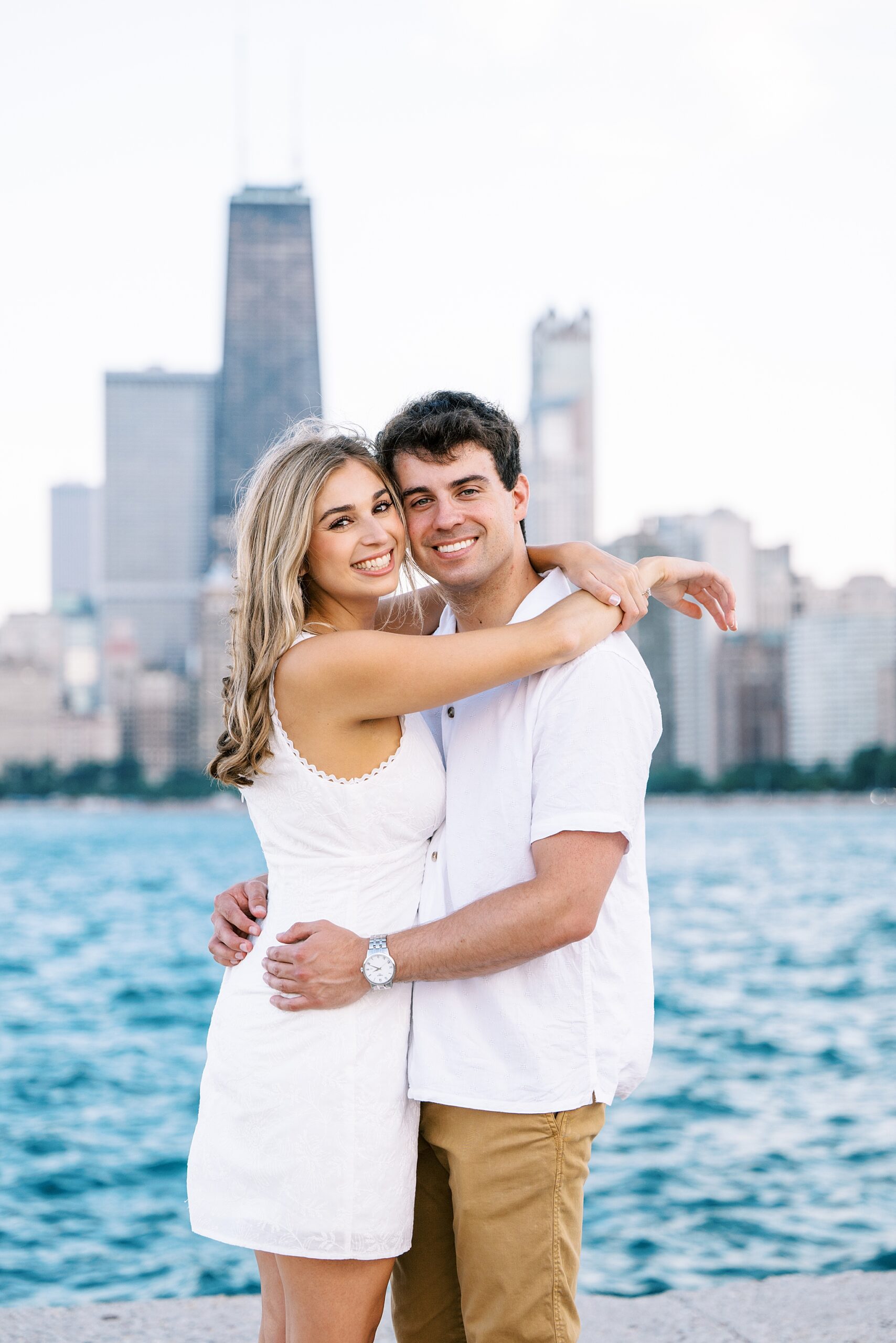 Summer engagement photos at the Wrigley Building & North Avenue Beach with Chicago wedding photographer Kim Ritchie Photography.