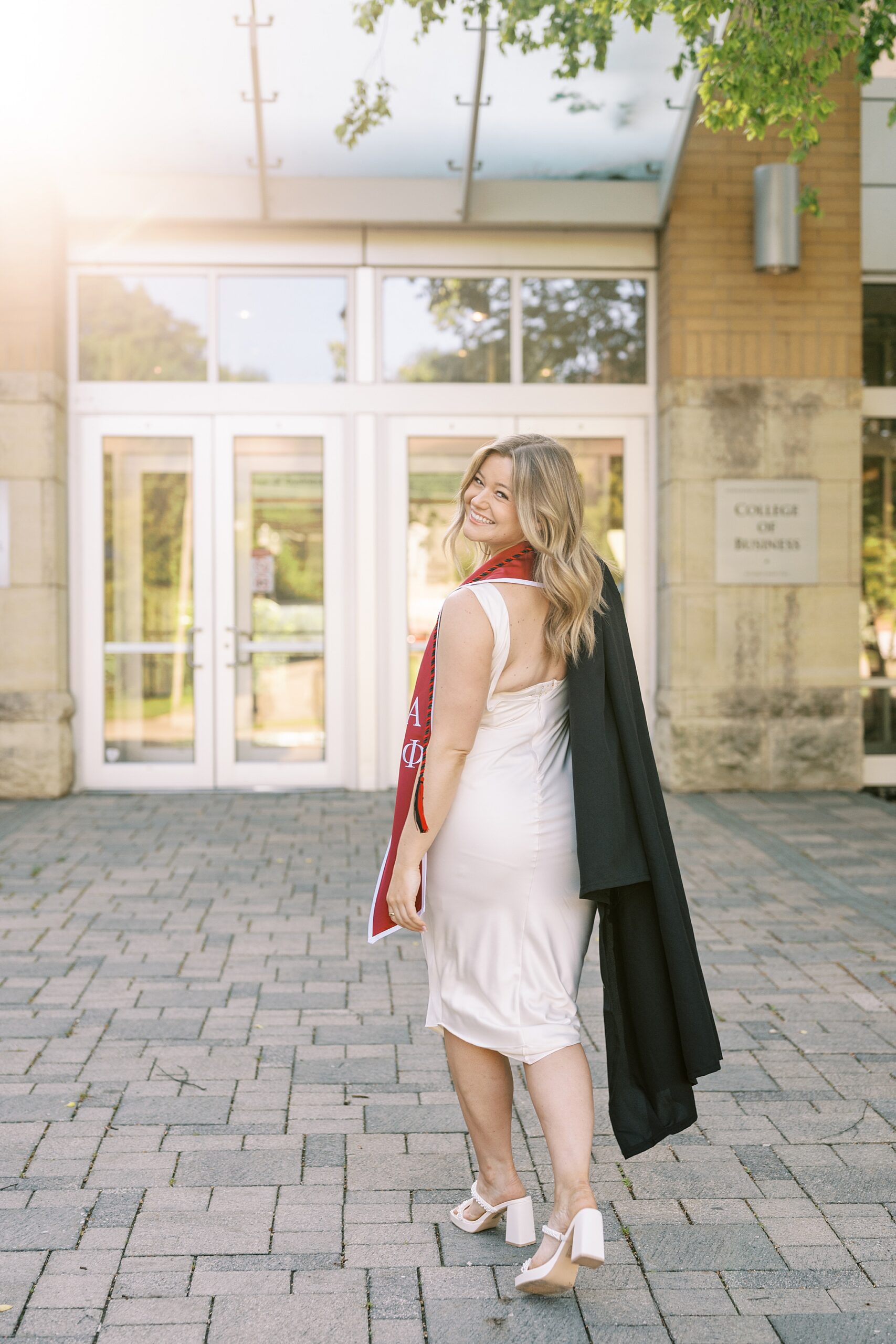 Northern Illinois University college graduation portraits | College cap and gown portraits at Northern Illinois University by Chicago senior photographer Kim Ritchie Photography.