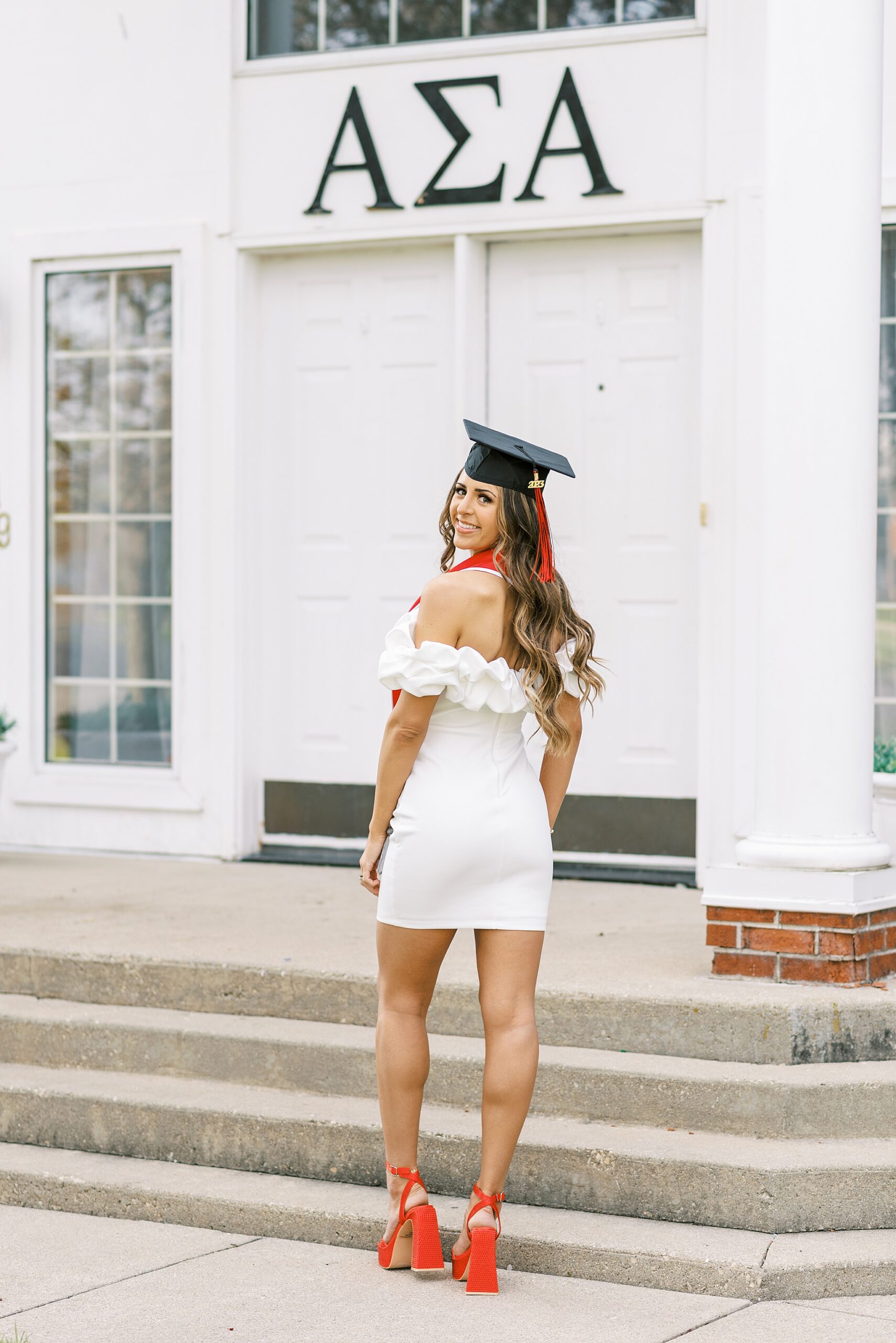 Northern Illinois University college graduation portraits | College cap and gown portraits at Northern Illinois University by Chicago senior photographer Kim Ritchie Photography.
