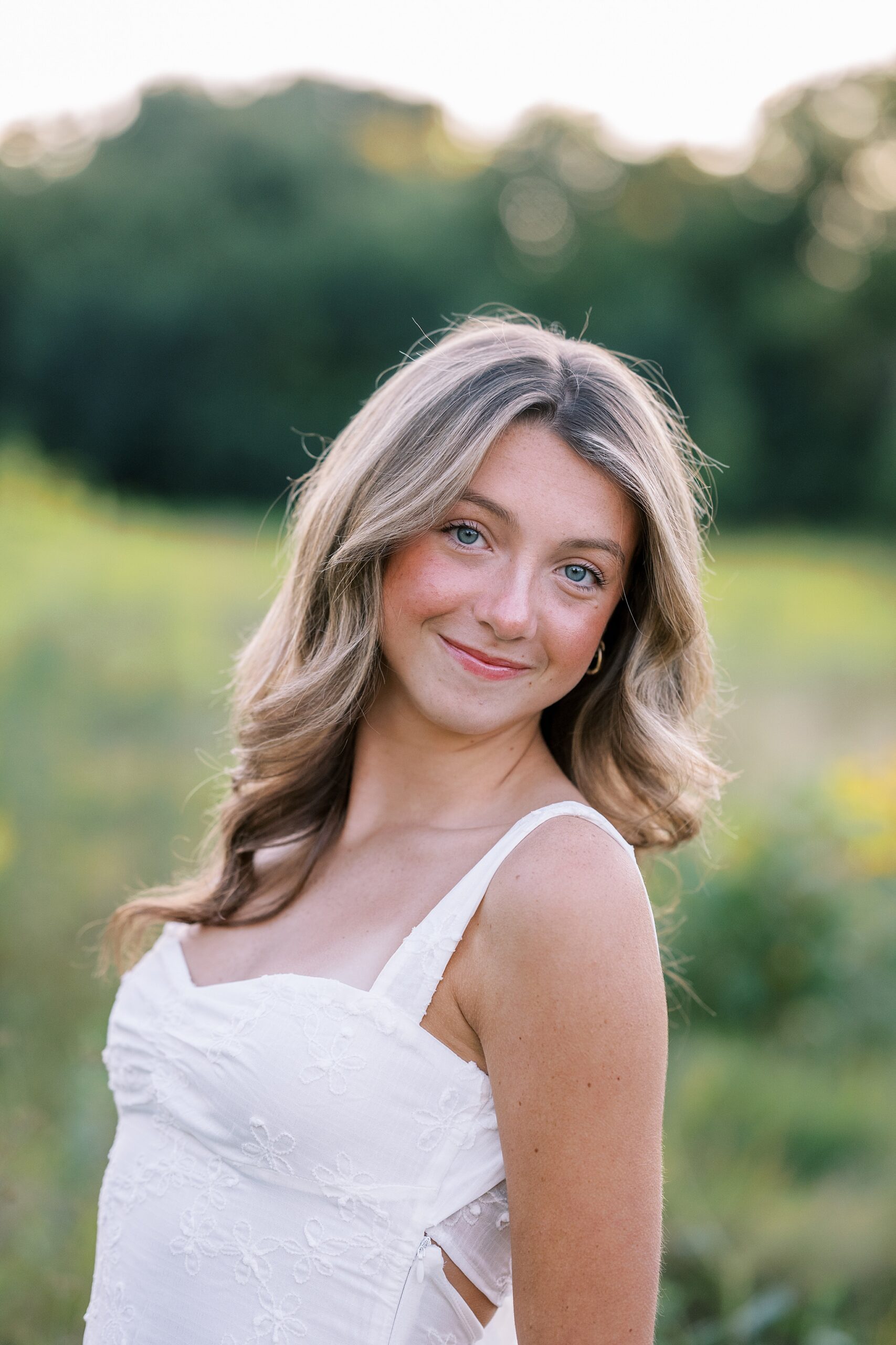 Fall senior portraits in Downtown Geneva and LeRoy Oakes Forest Preserve in St. Charles, Illinois with Kim Ritchie Photography.