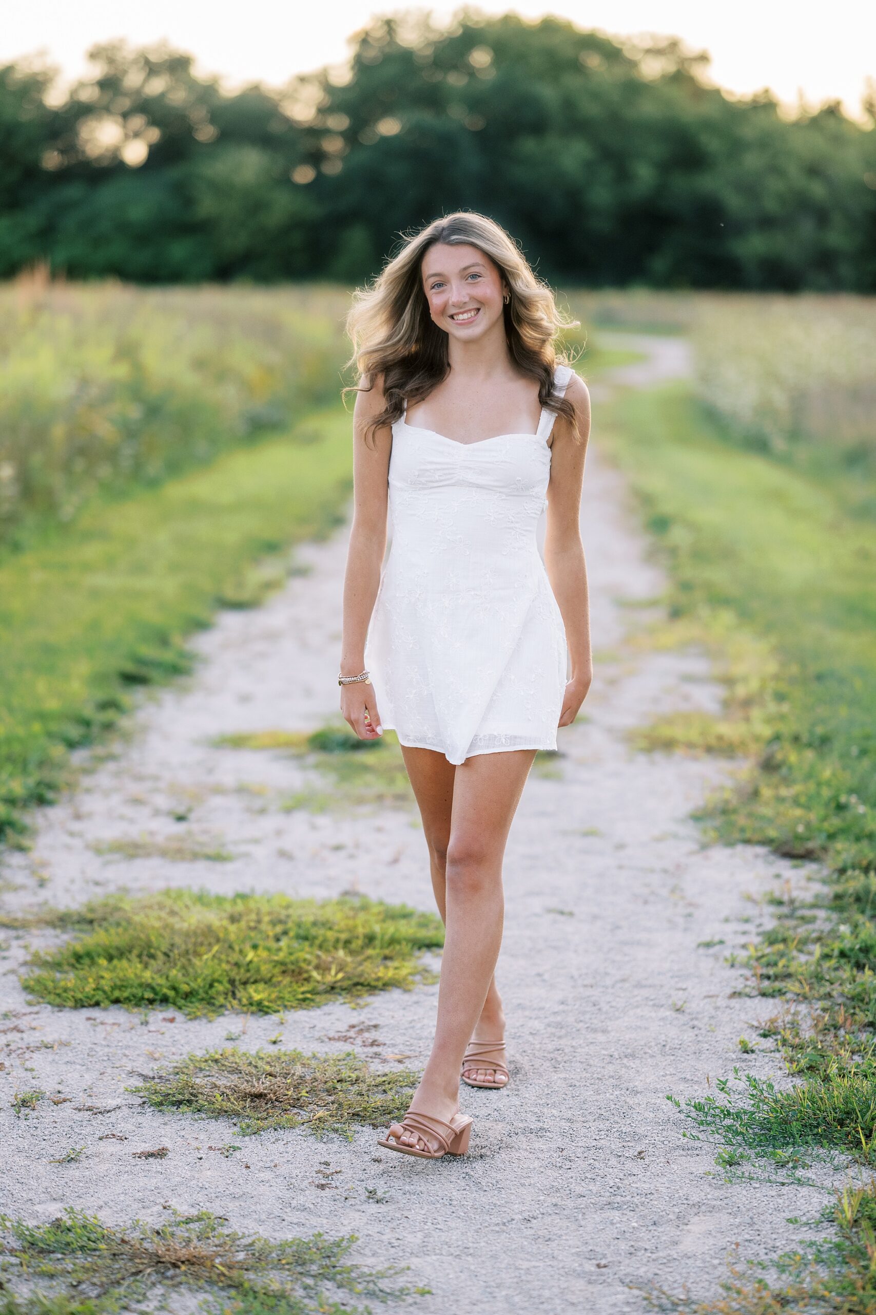 Fall senior portraits in Downtown Geneva and LeRoy Oakes Forest Preserve in St. Charles, Illinois with Kim Ritchie Photography.