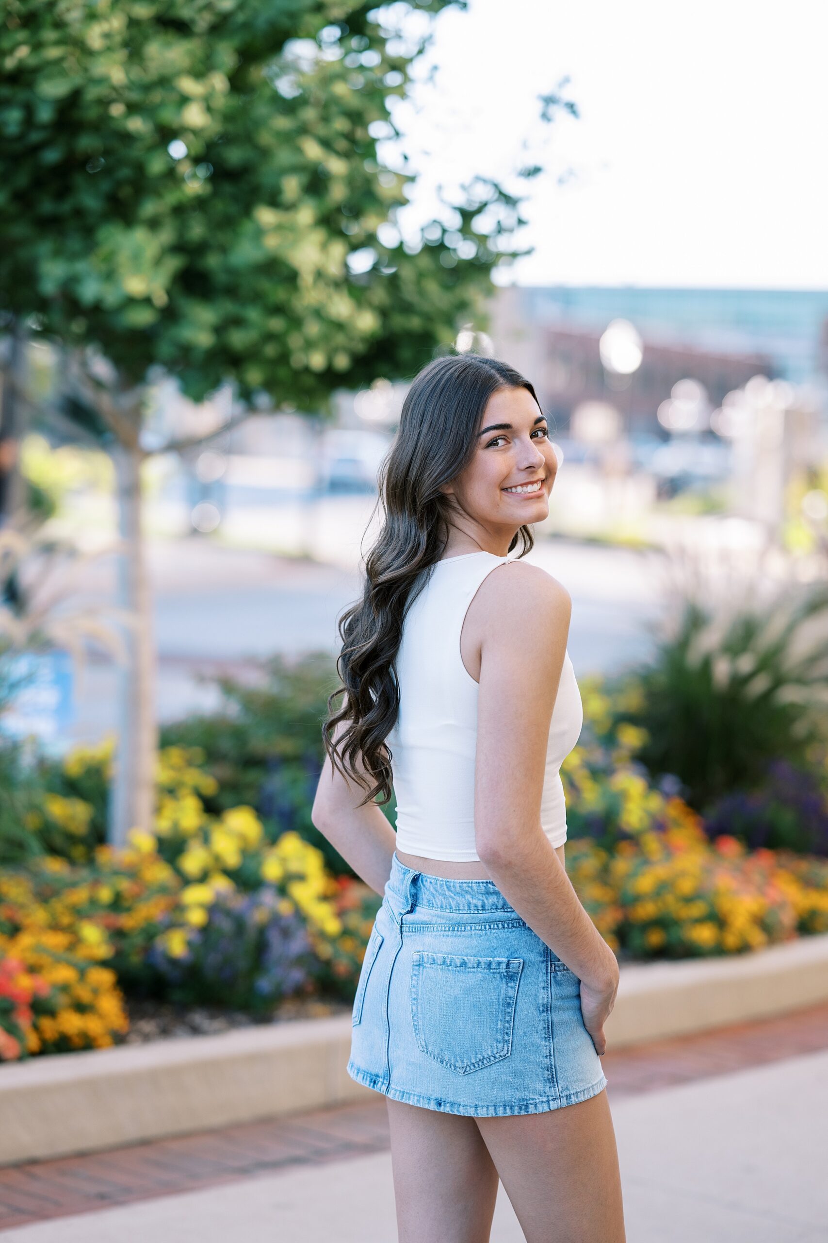 Late summer senior portraits in Downtown Aurora, Illinois with Chicago suburbs senior photographer Kim Ritchie Photography.