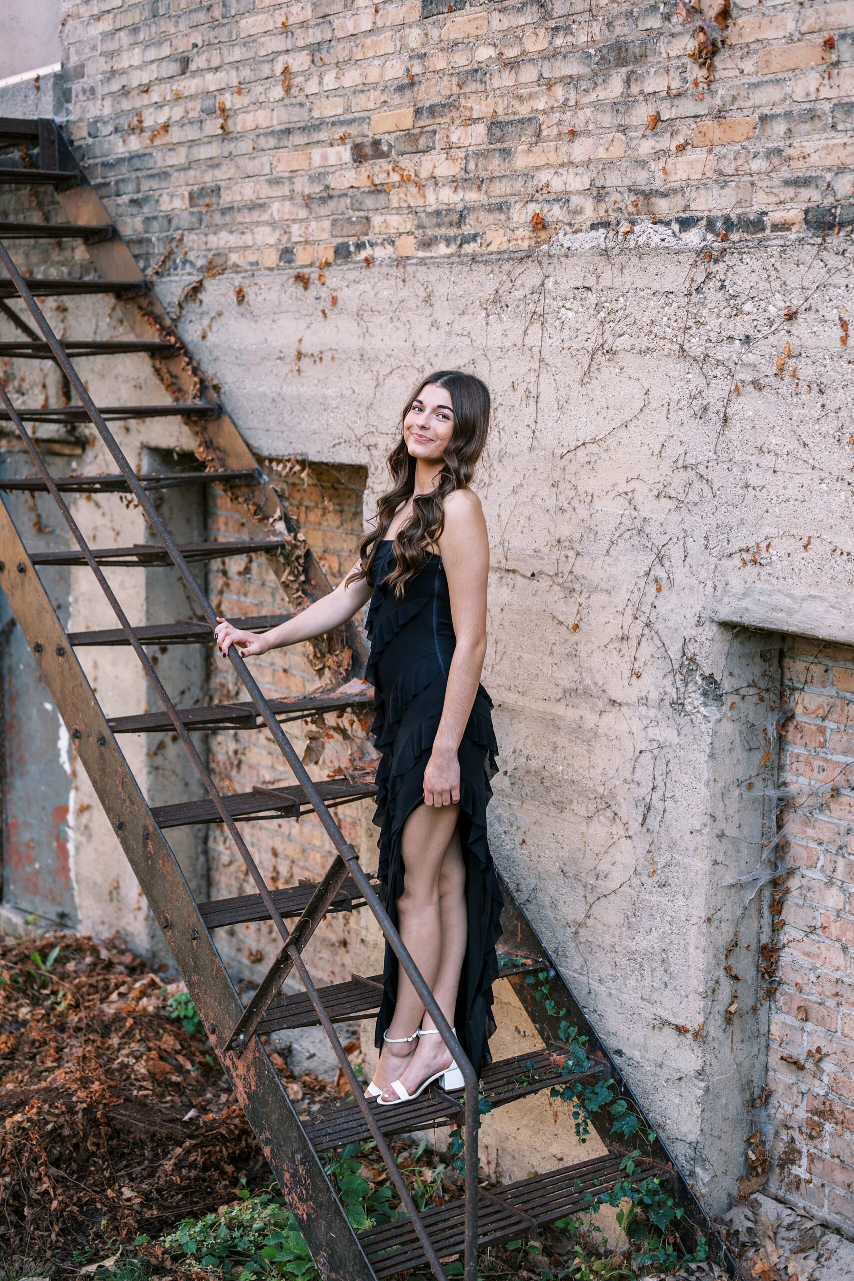 Late summer senior portraits in Downtown Aurora, Illinois with Chicago suburbs senior photographer Kim Ritchie Photography.