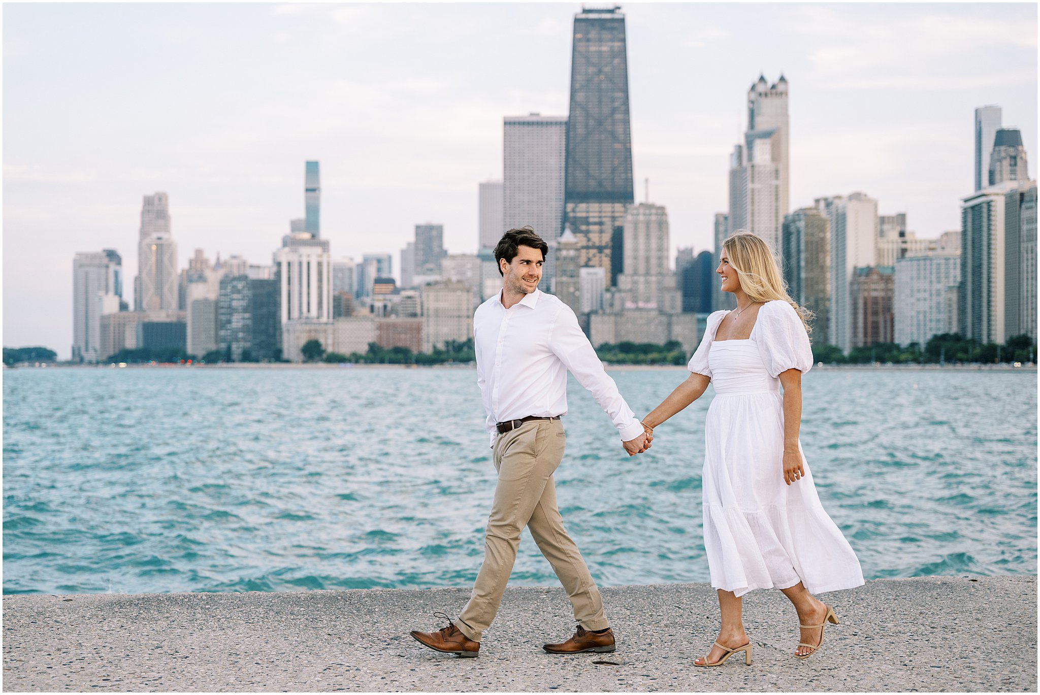 Chicago summer engagement photos at The Wrigley Building & North Avenue Beach with Chicago wedding photographer Kim Ritchie Photography.