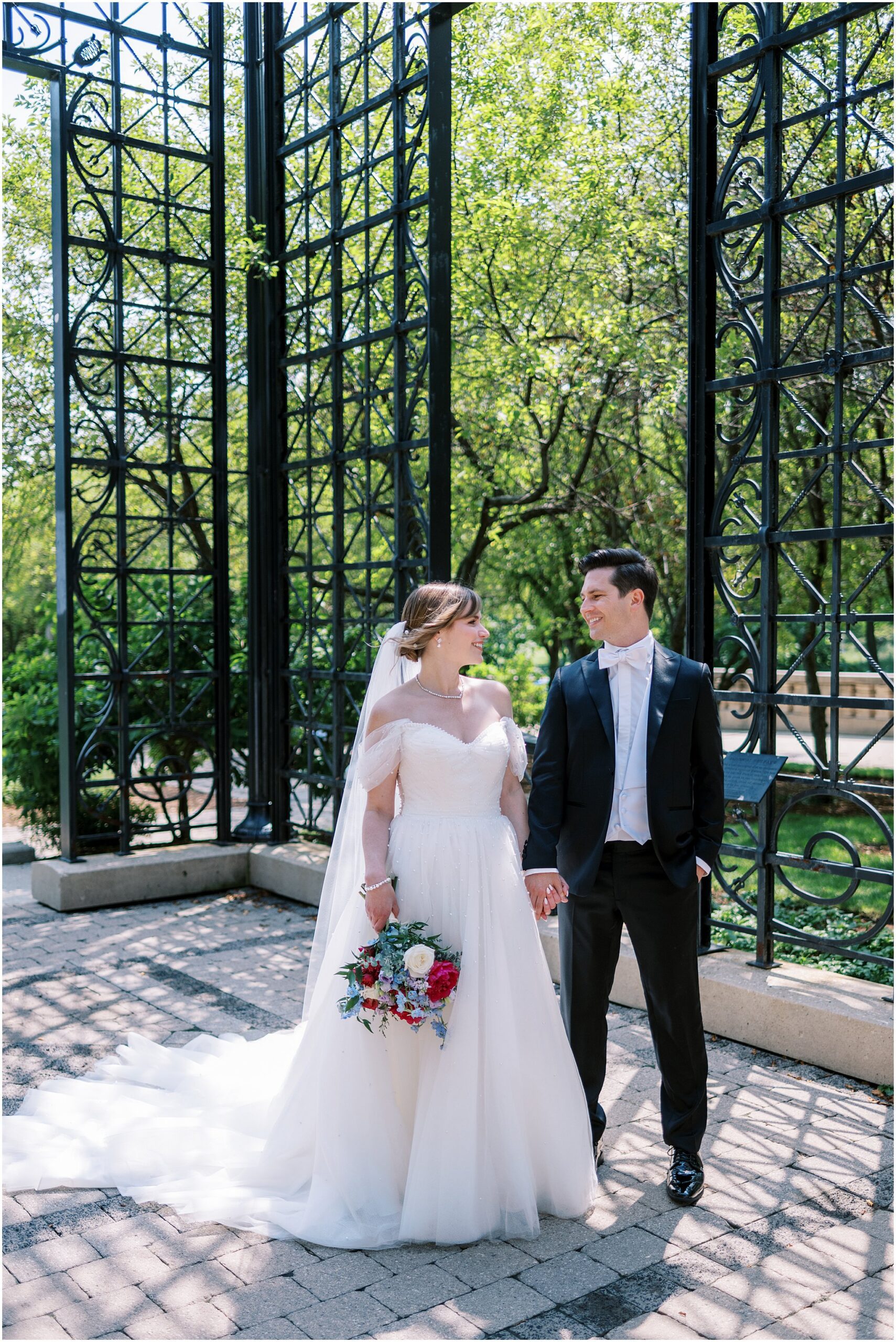 Katelyn & Eric’s early summer Adler Planetarium wedding in Chicago featured skyline views, golden hour glow, colorful details, and a joyful celebration.