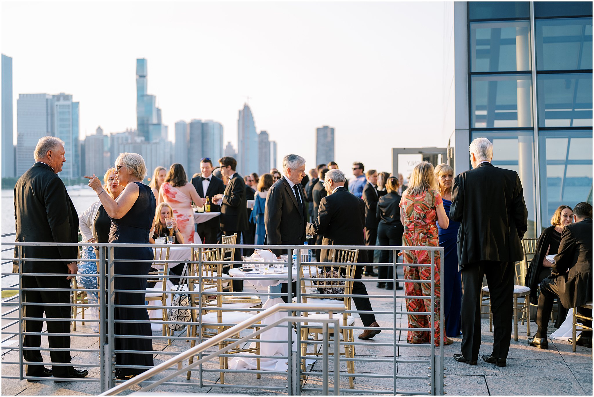 Katelyn & Eric’s early summer Adler Planetarium wedding in Chicago featured skyline views, golden hour glow, colorful details, and a joyful celebration.