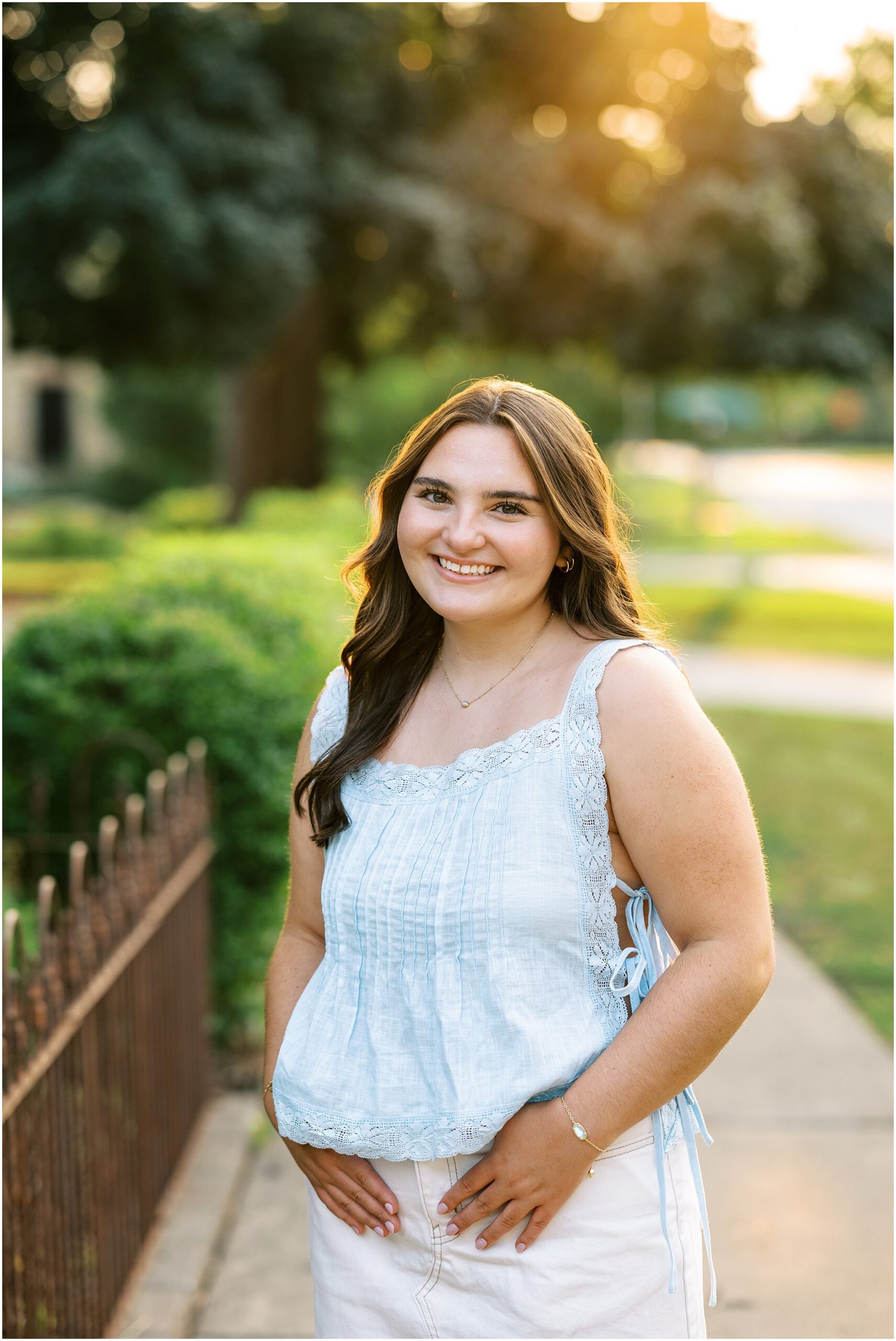 Explore these Geneva, Illinois senior photos with charming downtown locations and golden-hour light photographed by Kim Ritchie Photography.