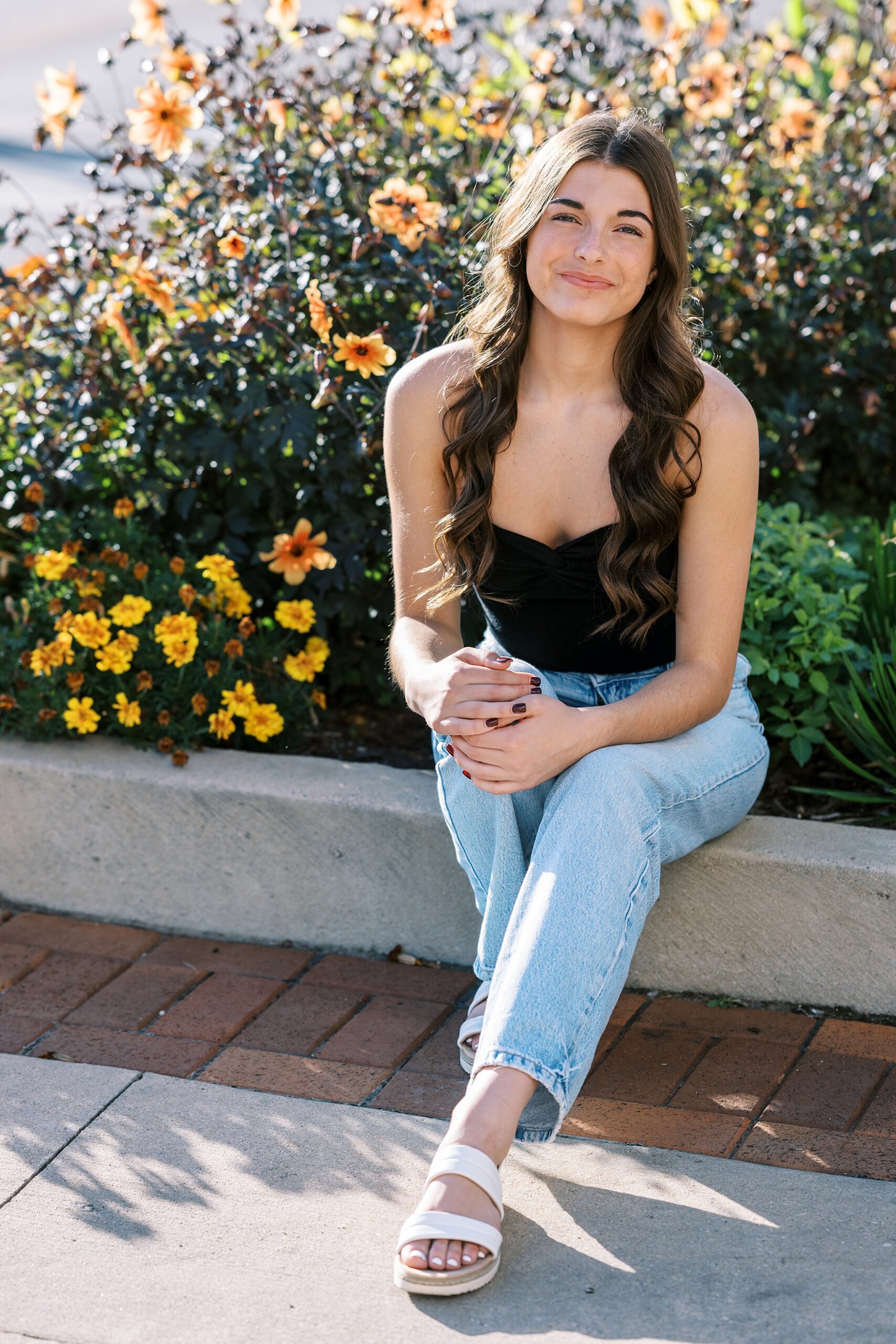 Late summer senior portraits in Downtown Aurora, Illinois with Chicago suburbs senior photographer Kim Ritchie Photography.